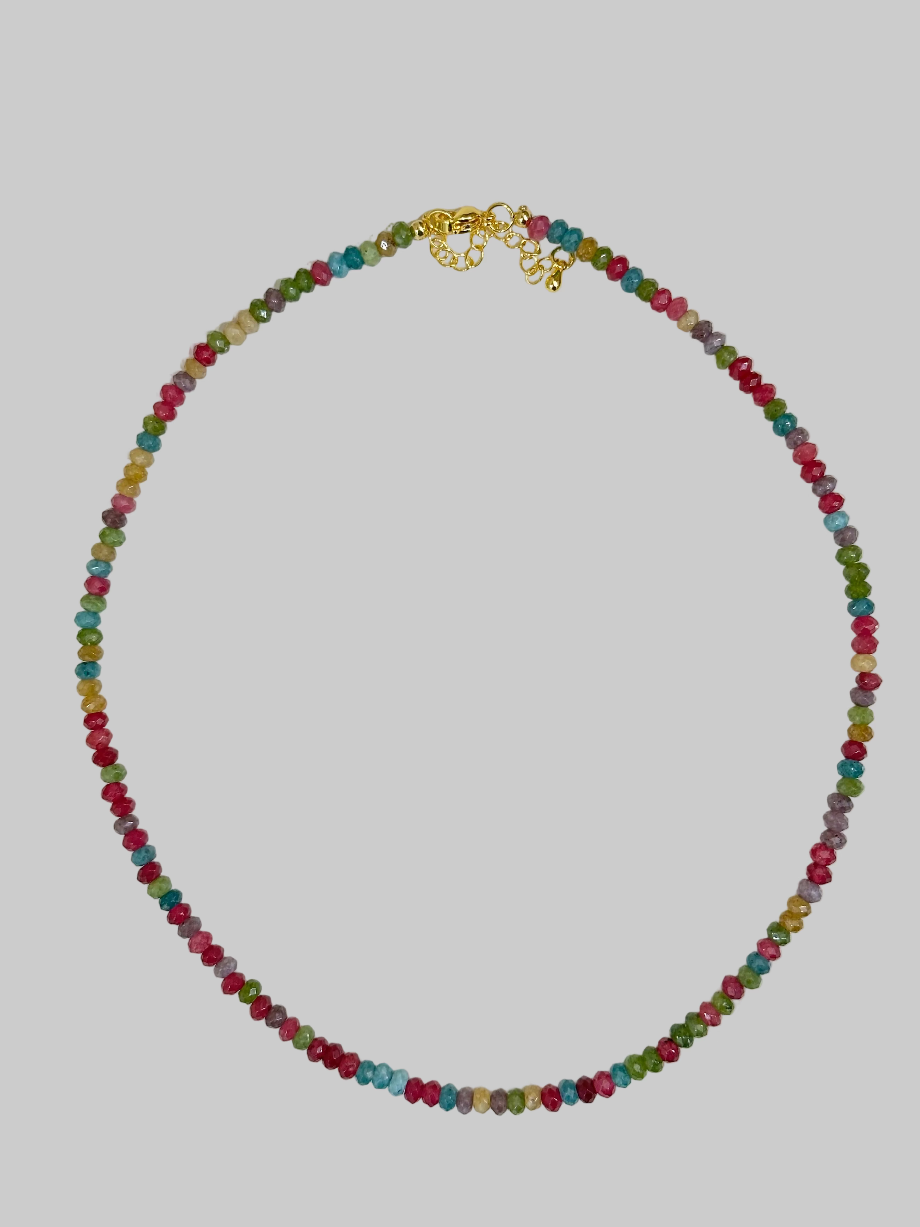 Multicolored beaded necklace on a white background